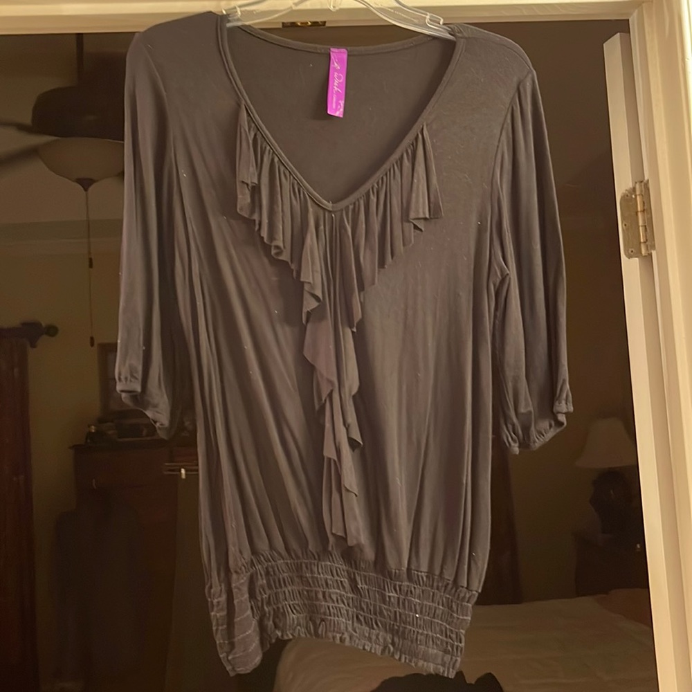 Black knit ruffled top
